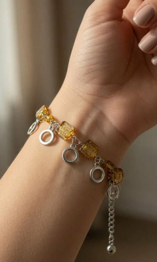 Жіночий браслет з підвісками у золотих відтінках 26502 Сріблястий