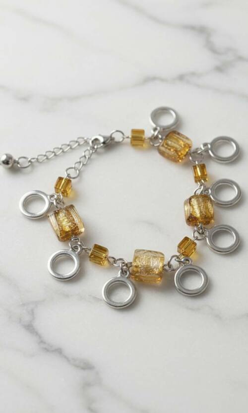 Жіночий браслет з підвісками у золотих відтінках 26502 Сріблястий